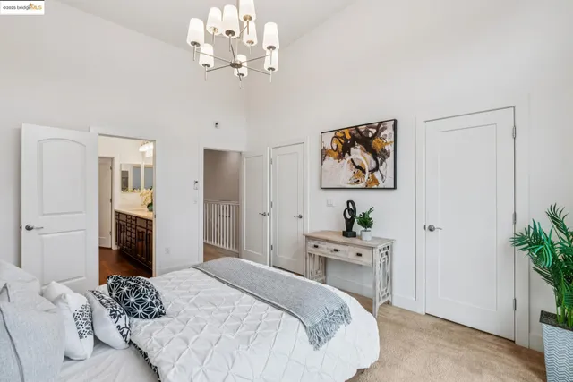 a spacious bathroom with a double vanity sink shower and a mirror