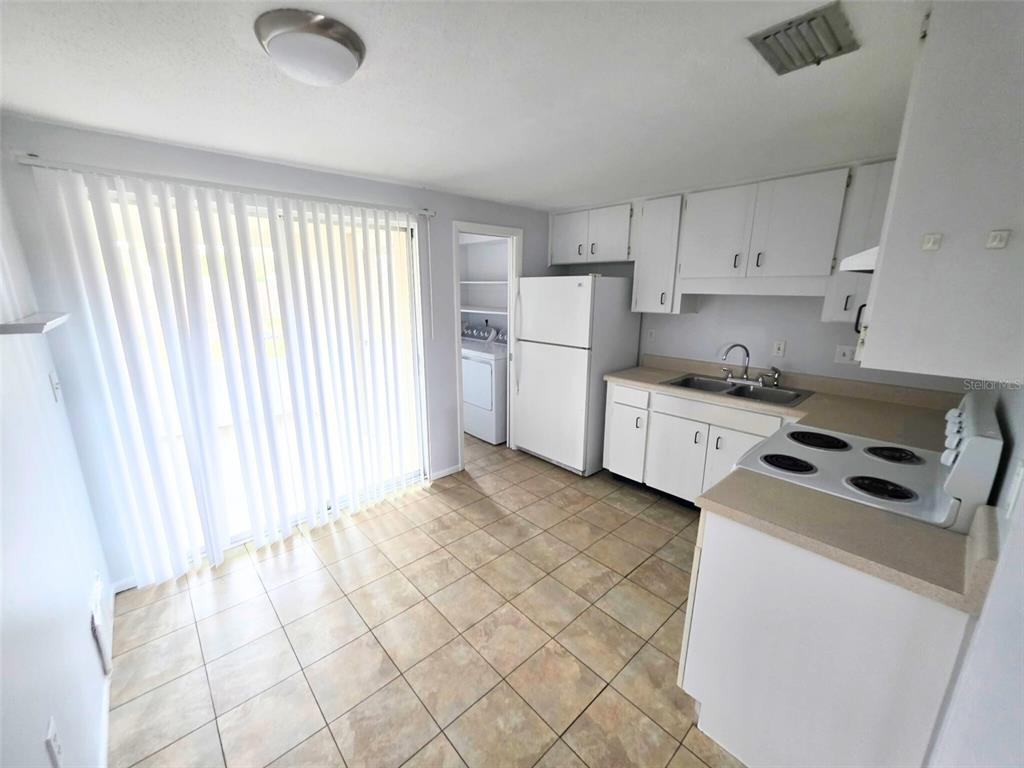 546 Briarwood Road Venice, FL 34293 - Photo 8 of 20 a room with storage and utility