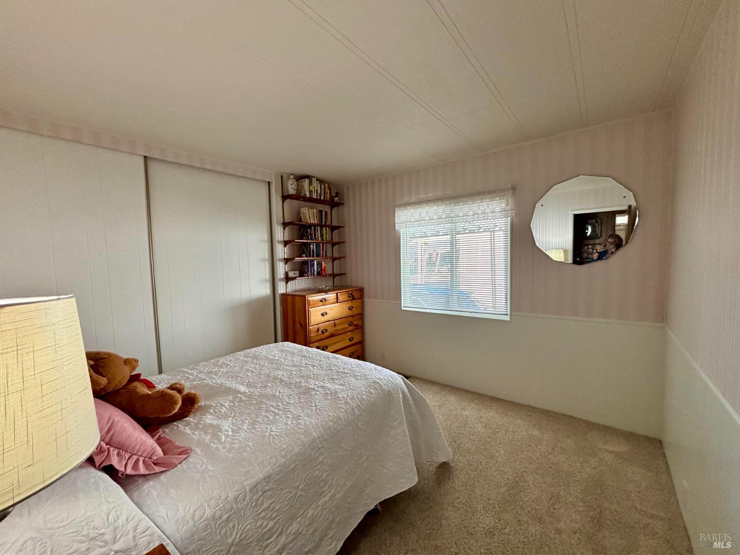 109 Estrella Drive Santa Rosa, CA 95403 - Photo 14 of 22 a bedroom with a bed and a window