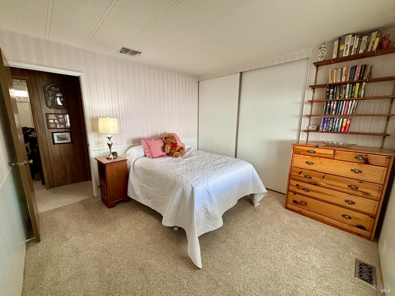 109 Estrella Drive Santa Rosa, CA 95403 - Photo 15 of 22 a bedroom with a bed and a closet