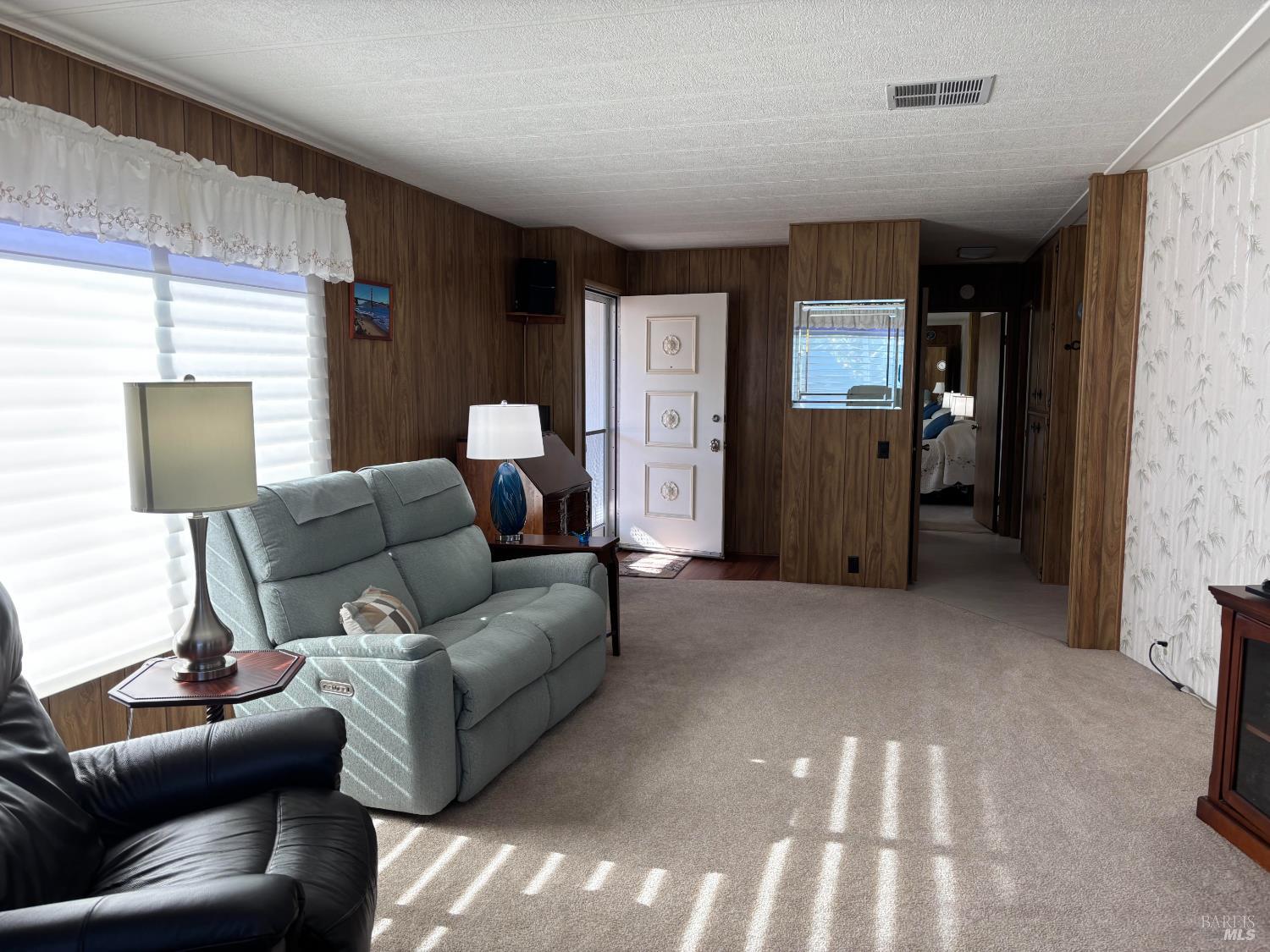 109 Estrella Drive Santa Rosa, CA 95403 - Photo 3 of 22 a living room with furniture and a window
