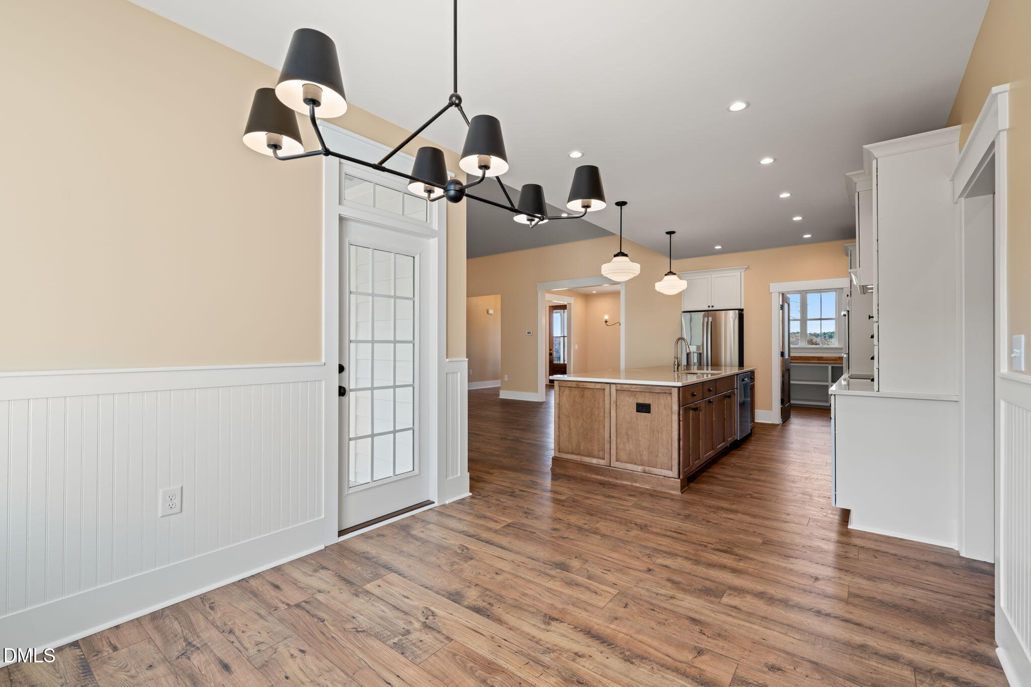 13887 Burgess Road Middlesex, NC 27557 - Photo 16 of 45 a view of a kitchen with furniture and wooden floor