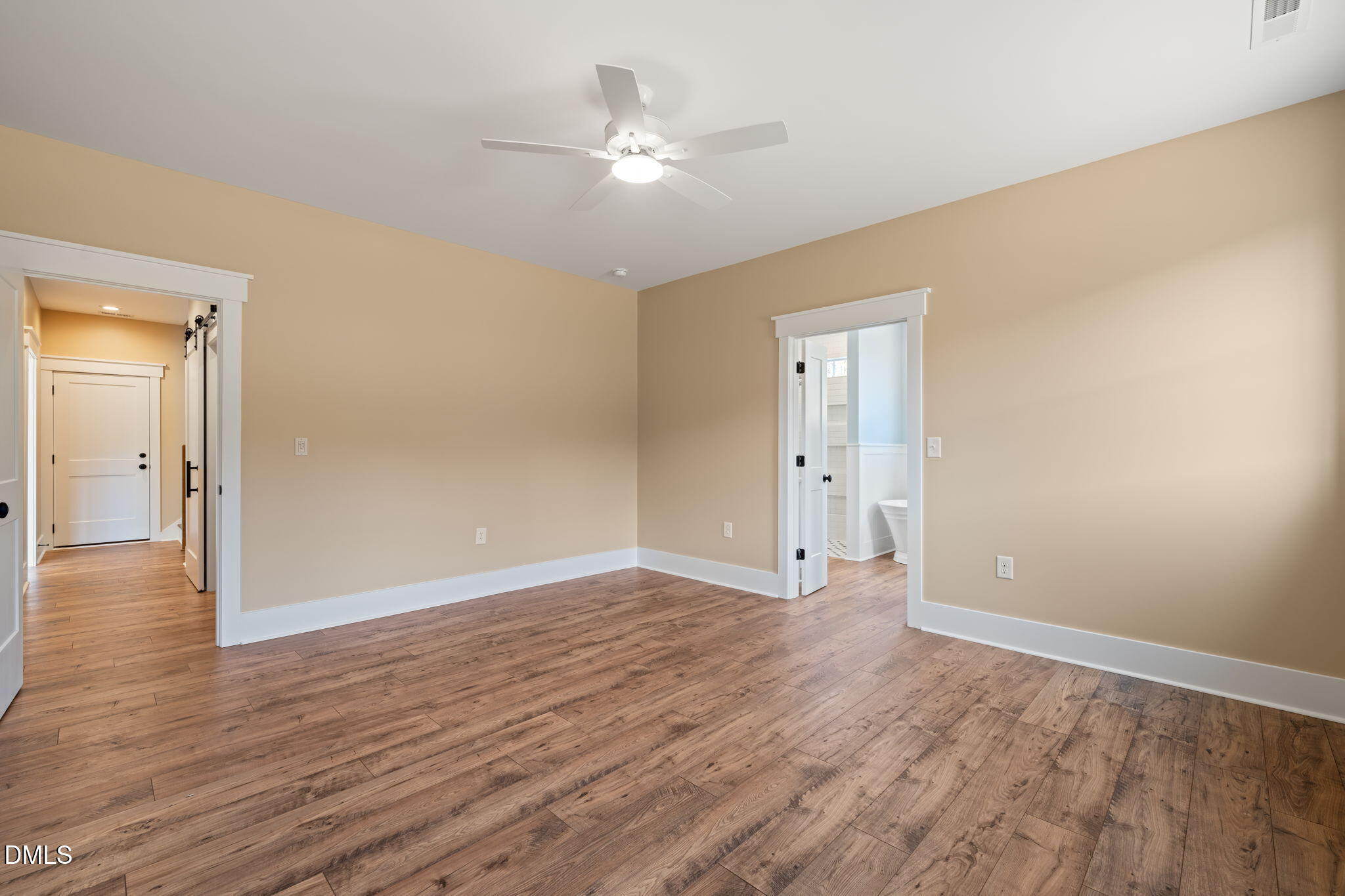 13887 Burgess Road Middlesex, NC 27557 - Photo 21 of 45 a view of an empty room with wooden floor