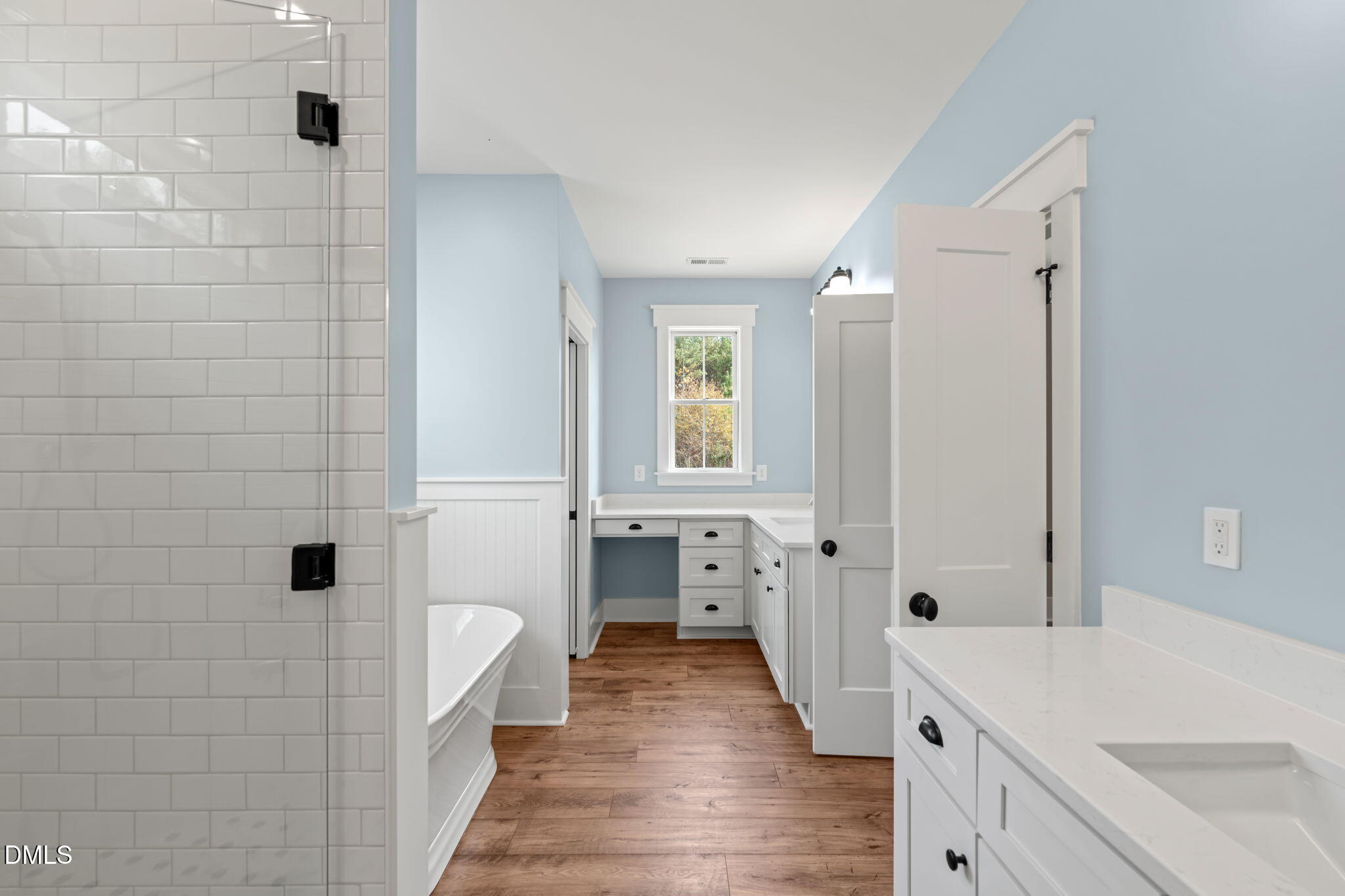 13887 Burgess Road Middlesex, NC 27557 - Photo 25 of 45 a bathroom with a sink a mirror and a shower