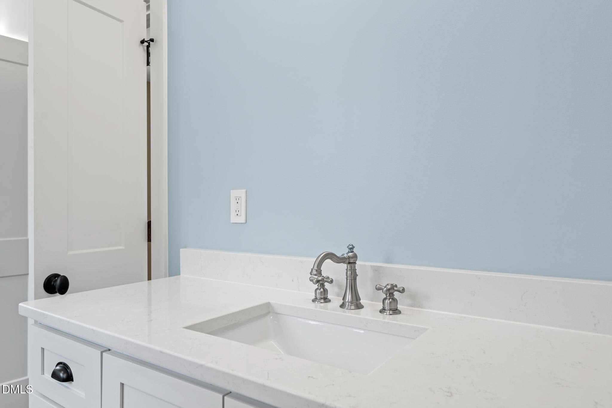 13887 Burgess Road Middlesex, NC 27557 - Photo 26 of 45 a bathroom with a sink and a mirror