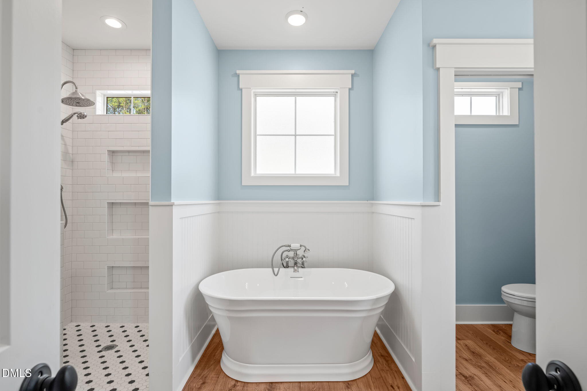 13887 Burgess Road Middlesex, NC 27557 - Photo 29 of 45 a bathroom with a sink a toilet and shower
