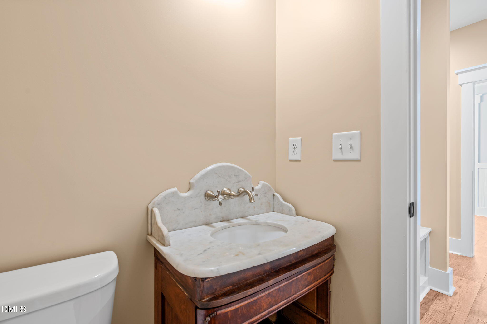 13887 Burgess Road Middlesex, NC 27557 - Photo 31 of 45 a bathroom with a sink toilet and mirror