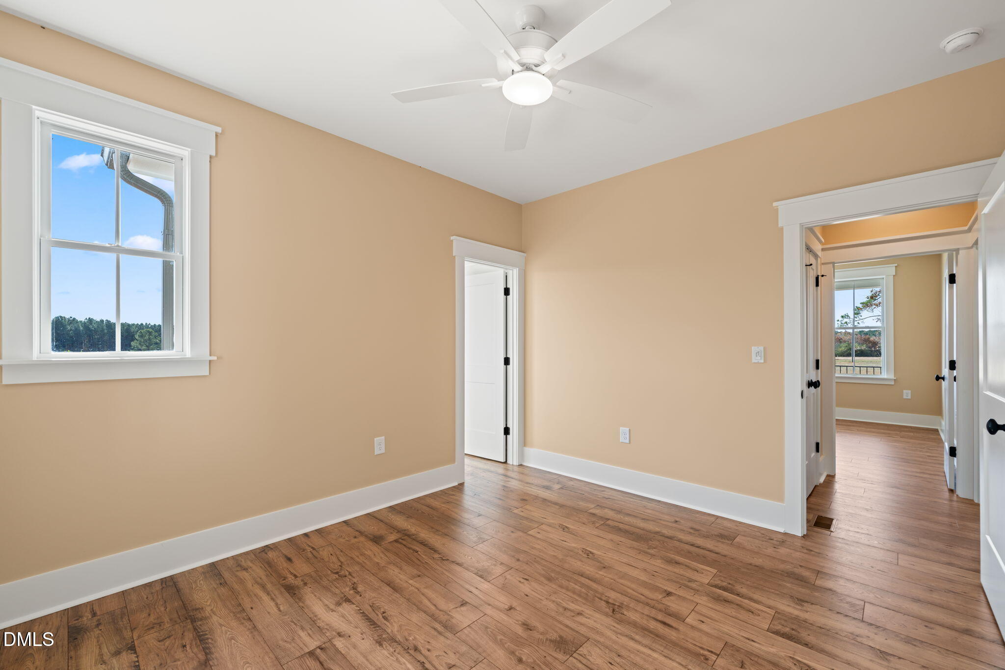 13887 Burgess Road Middlesex, NC 27557 - Photo 36 of 45 wooden floor in an empty room with a window