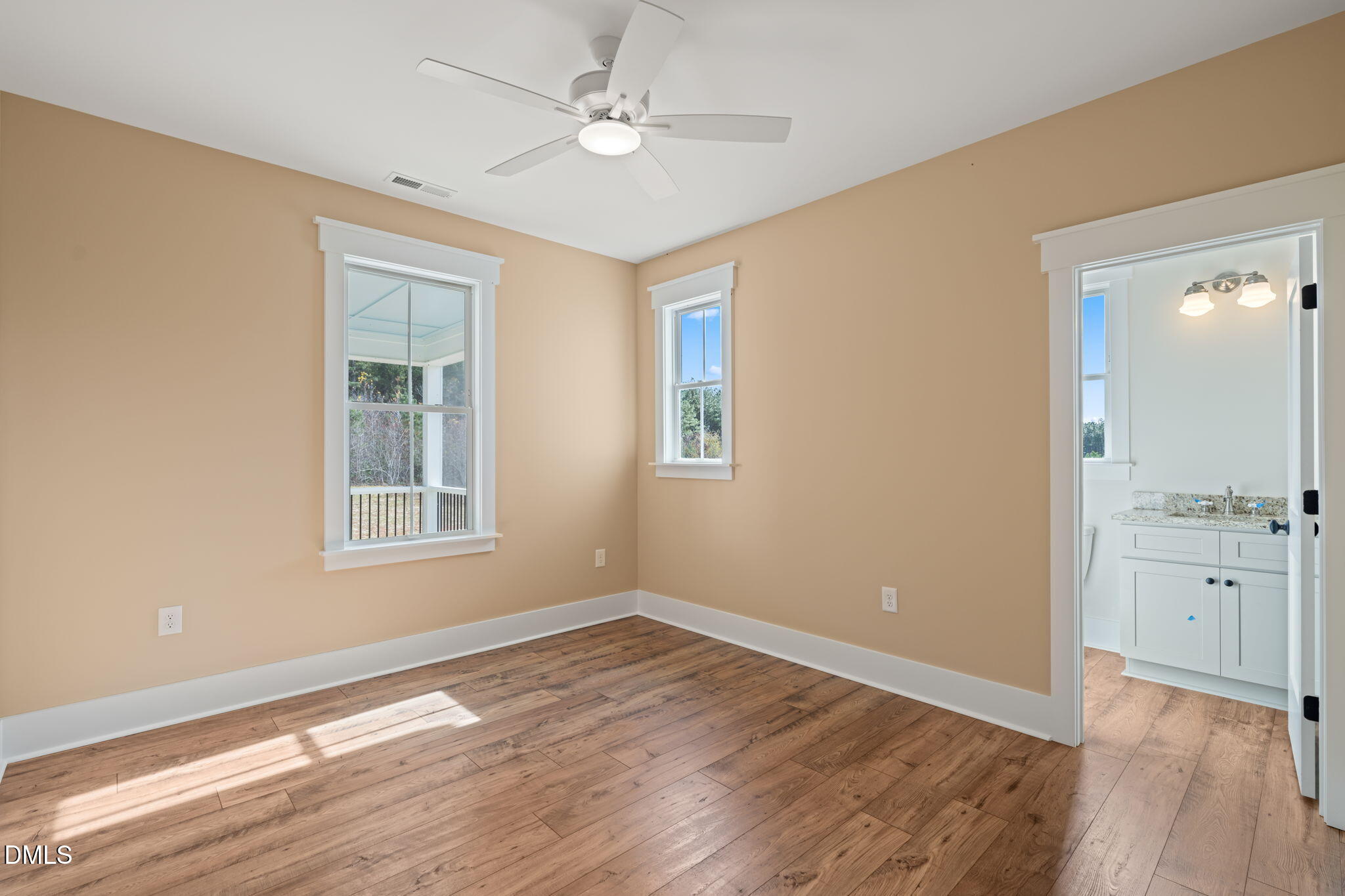 13887 Burgess Road Middlesex, NC 27557 - Photo 37 of 45 wooden floor in an empty room with a window