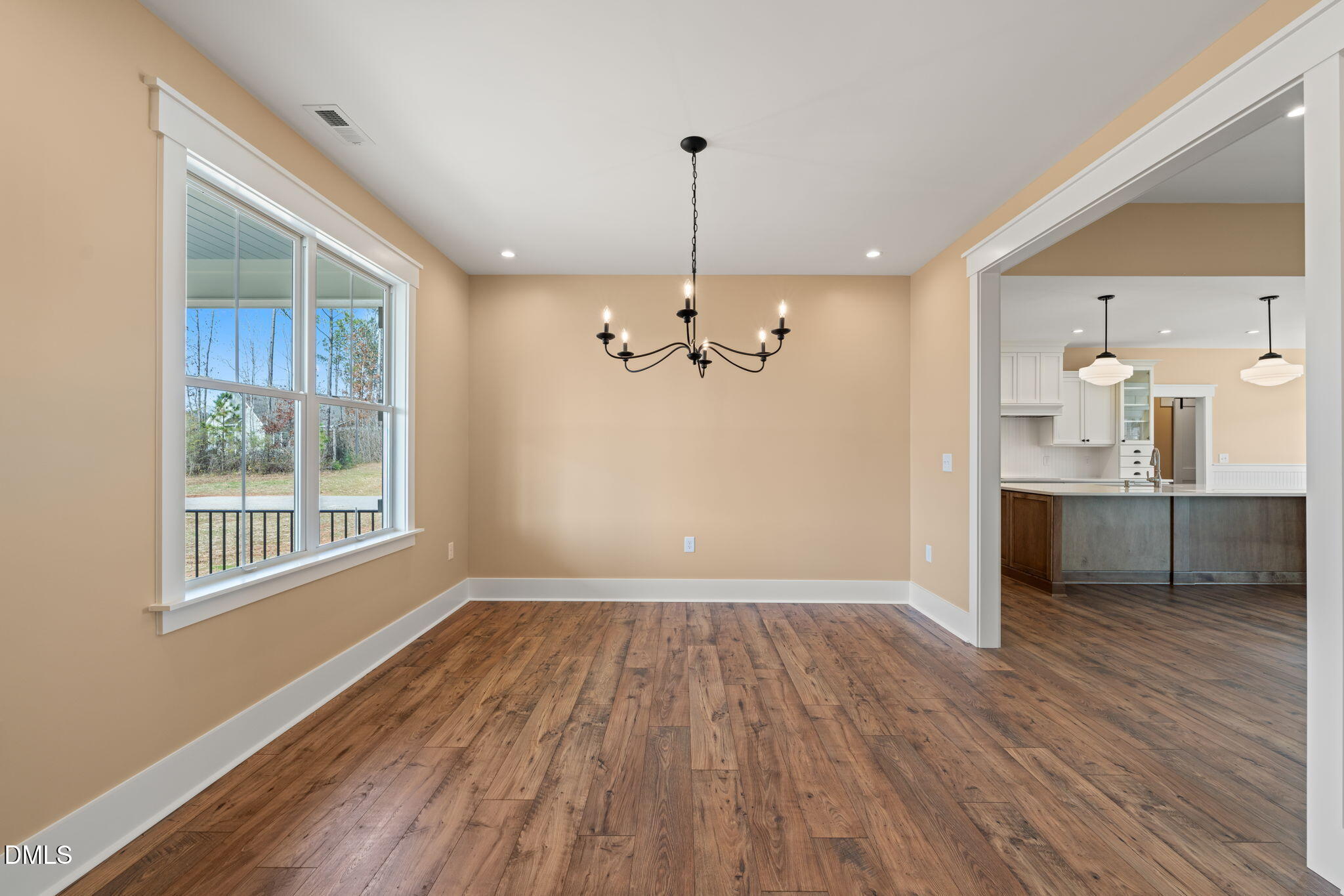 13887 Burgess Road Middlesex, NC 27557 - Photo 5 of 45 a view of a kitchen with wooden floor and a kitchen