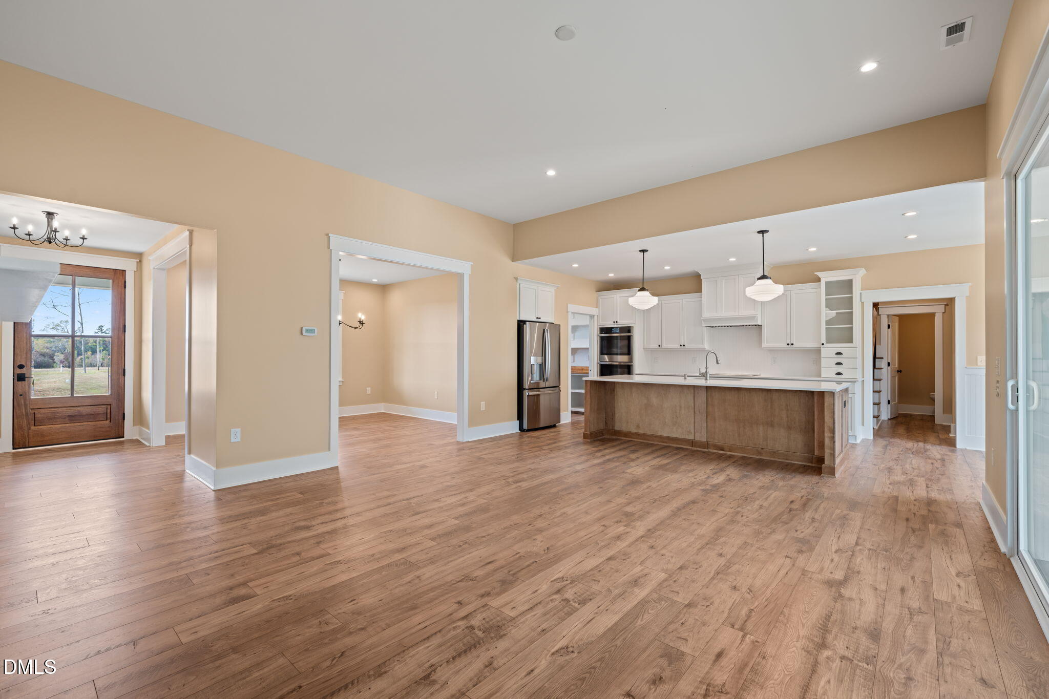 13887 Burgess Road Middlesex, NC 27557 - Photo 10 of 45 a big room with wooden floor and windows