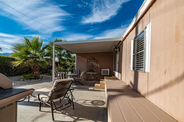 a building outdoor space with patio furniture