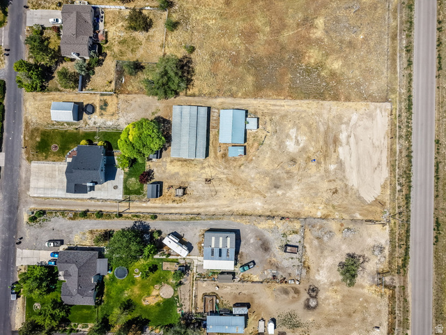 3732 Campbell Road Tooele, UT 84074 - Photo 66 of 69 Aerial view highlighting an expansive residential property with several outbuildings