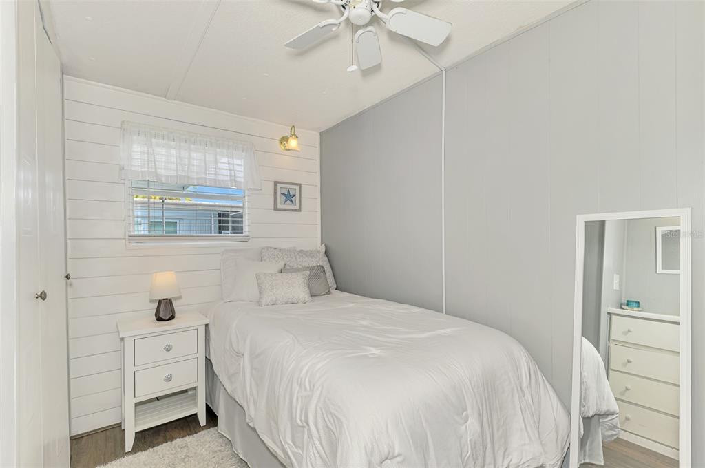 259 Inner Drive East Venice, FL 34285 - Photo 18 of 26 a bedroom with a bed and a window