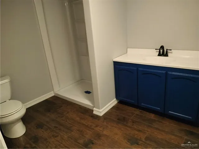 a bathroom with a sink and a toilet