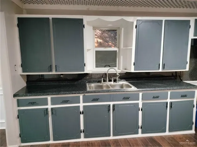 a close view of a sink and a mirror