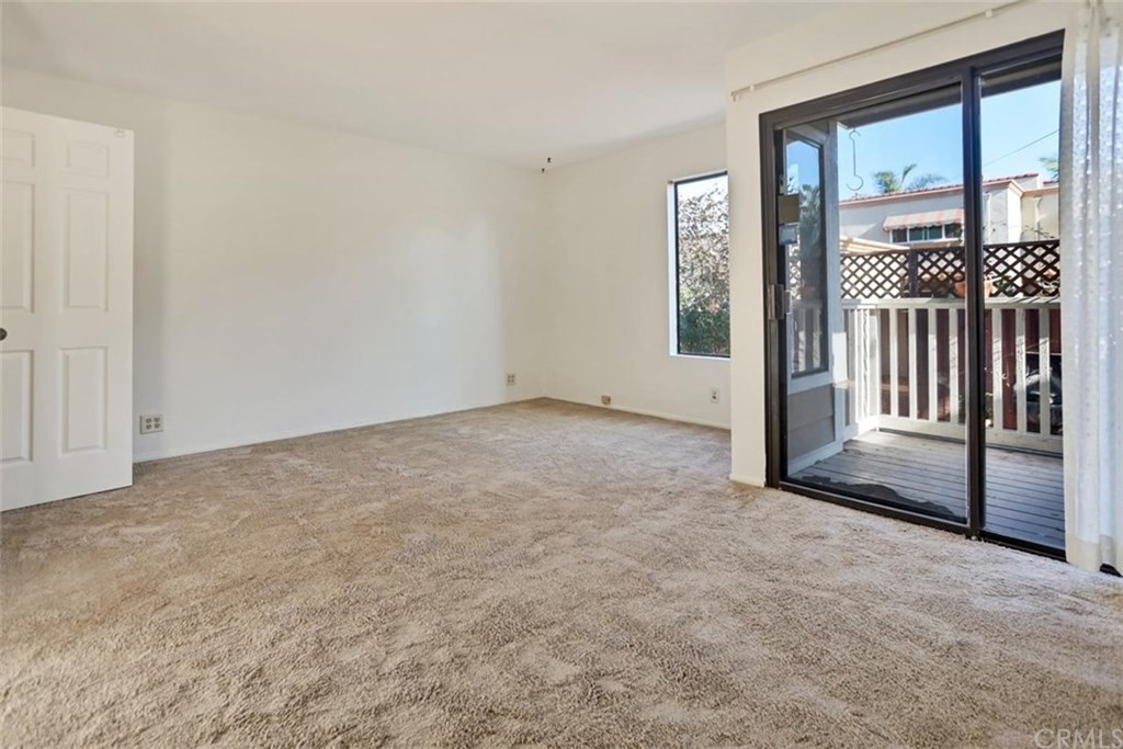 292 Palmer Street, Unit C2 Costa Mesa, CA 92627 - Photo 11 of 40 Master Bedroom on 1st level is large and has lots of windows making it very light and bright it even has its own private patio and entrance.