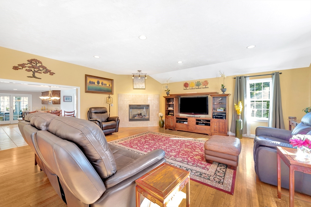105 Hadley Road Merrimac, MA 01860 - Photo 12 of 31 a living room with furniture and a flat screen tv