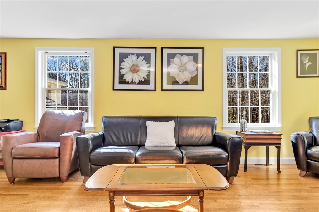 105 Hadley Road Merrimac, MA 01860 - Photo 14 of 31 a living room with furniture and a large window