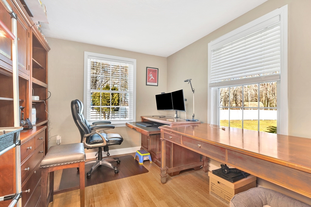 105 Hadley Road Merrimac, MA 01860 - Photo 16 of 31 a view of a workspace with a window and lounge chair