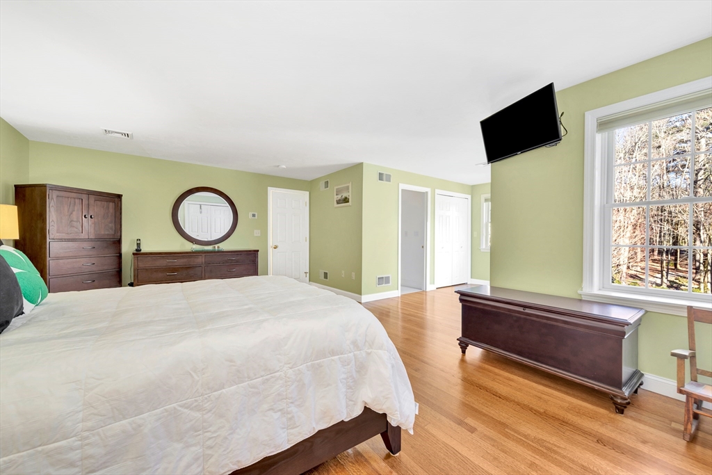 105 Hadley Road Merrimac, MA 01860 - Photo 20 of 31 a bedroom with a bed and window