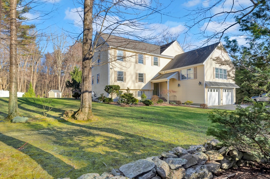 105 Hadley Road Merrimac, MA 01860 - Photo 2 of 31 a view of a house with a yard