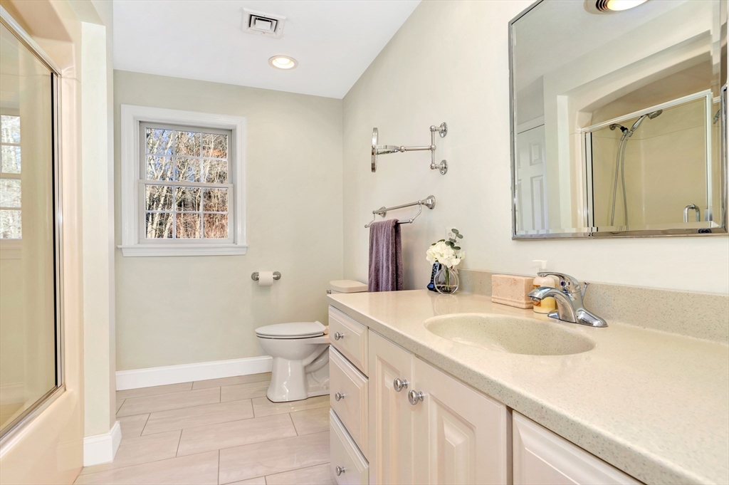 105 Hadley Road Merrimac, MA 01860 - Photo 24 of 31 a bathroom with a sink a toilet and shower
