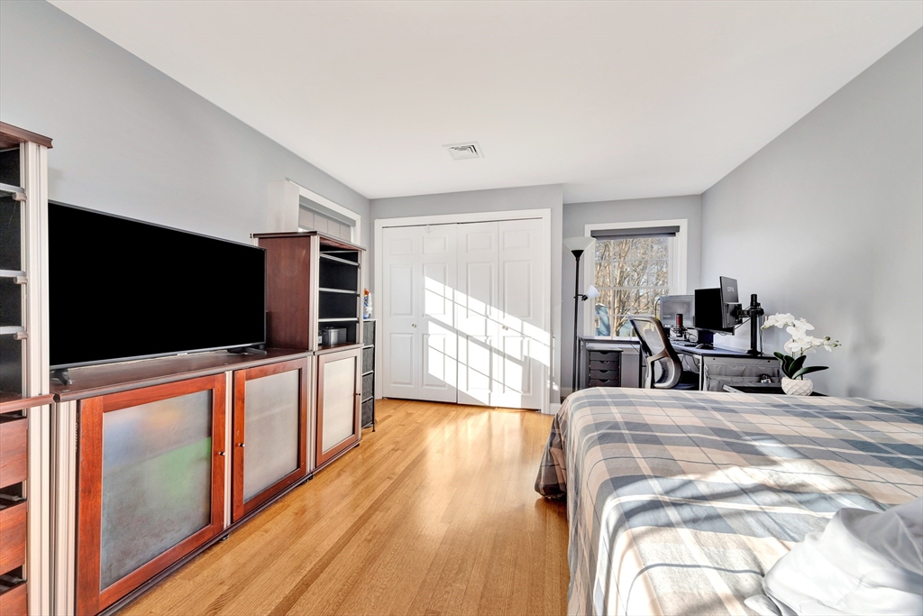 105 Hadley Road Merrimac, MA 01860 - Photo 25 of 31 a view of a livingroom with furniture and a flat screen tv