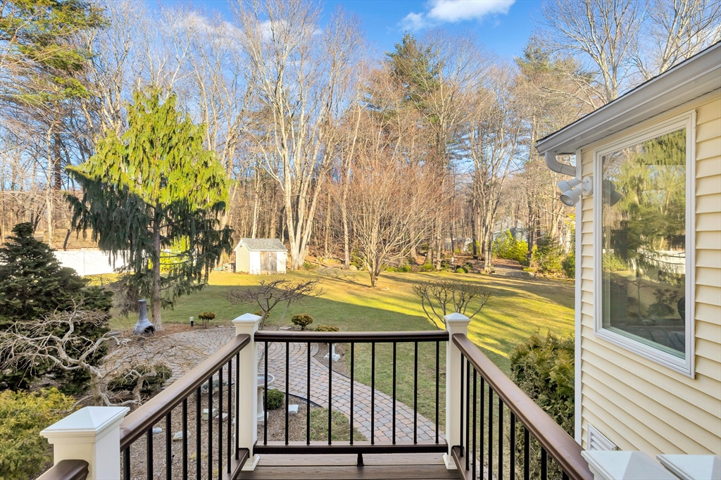 105 Hadley Road Merrimac, MA 01860 - Photo 30 of 31 a view of a balcony with two trees