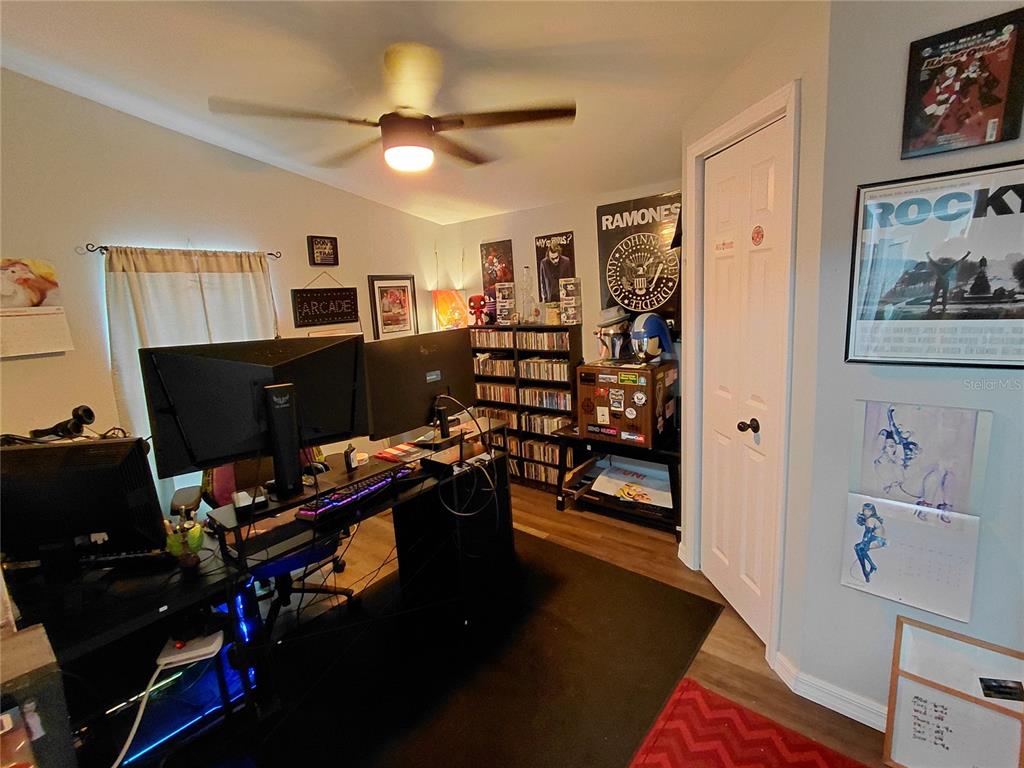 6758 North Capri Loop Hernando, FL 34442 - Photo 26 of 47 a workspace with furniture and wooden floor