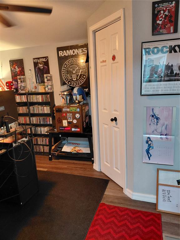 6758 North Capri Loop Hernando, FL 34442 - Photo 29 of 47 a living room with furniture and a flat screen tv