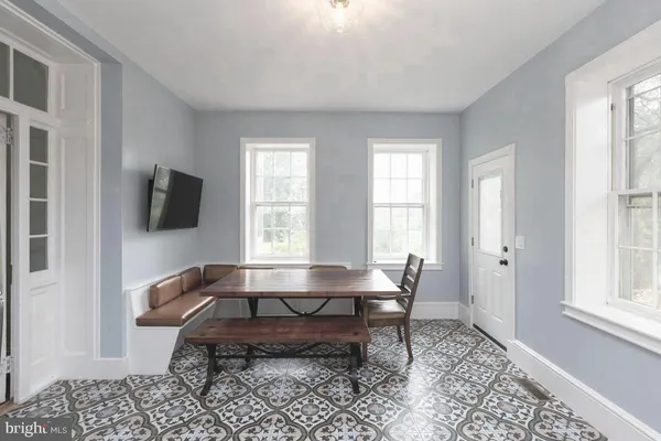 a living room with a couch and a table