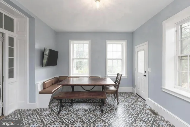 a living room with a couch and a table