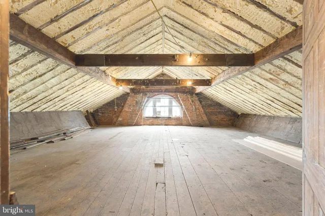 a view of outdoor space with wooden floor