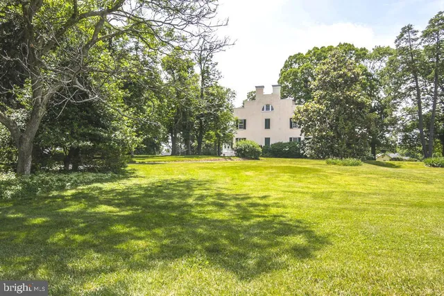 a view of swimming pool with an outdoor space and seating area