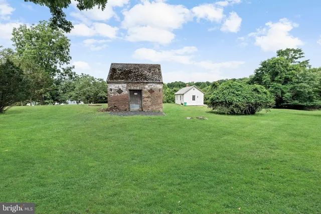 a view of a garden with an buildings and a park