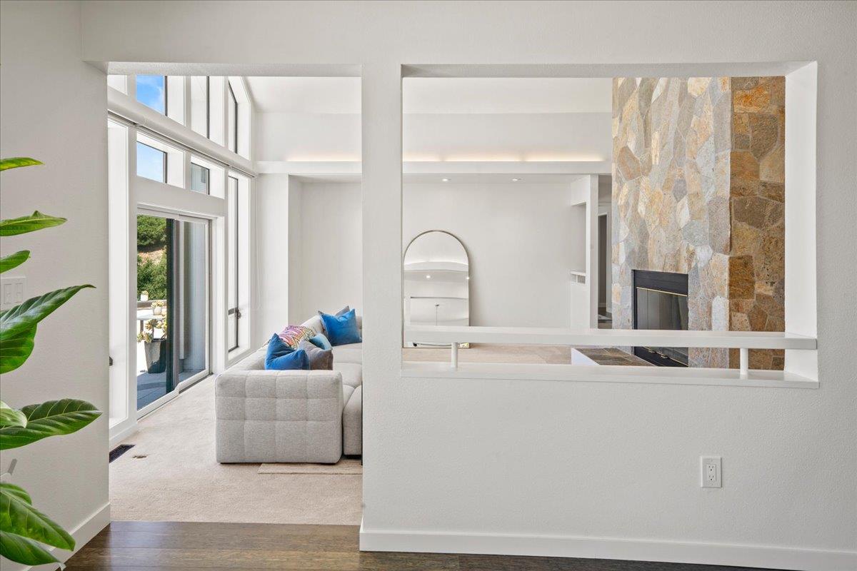 31499 Vía Las Rosas Carmel Valley, CA 93924 - Photo 11 of 44 a living room with furniture and a window