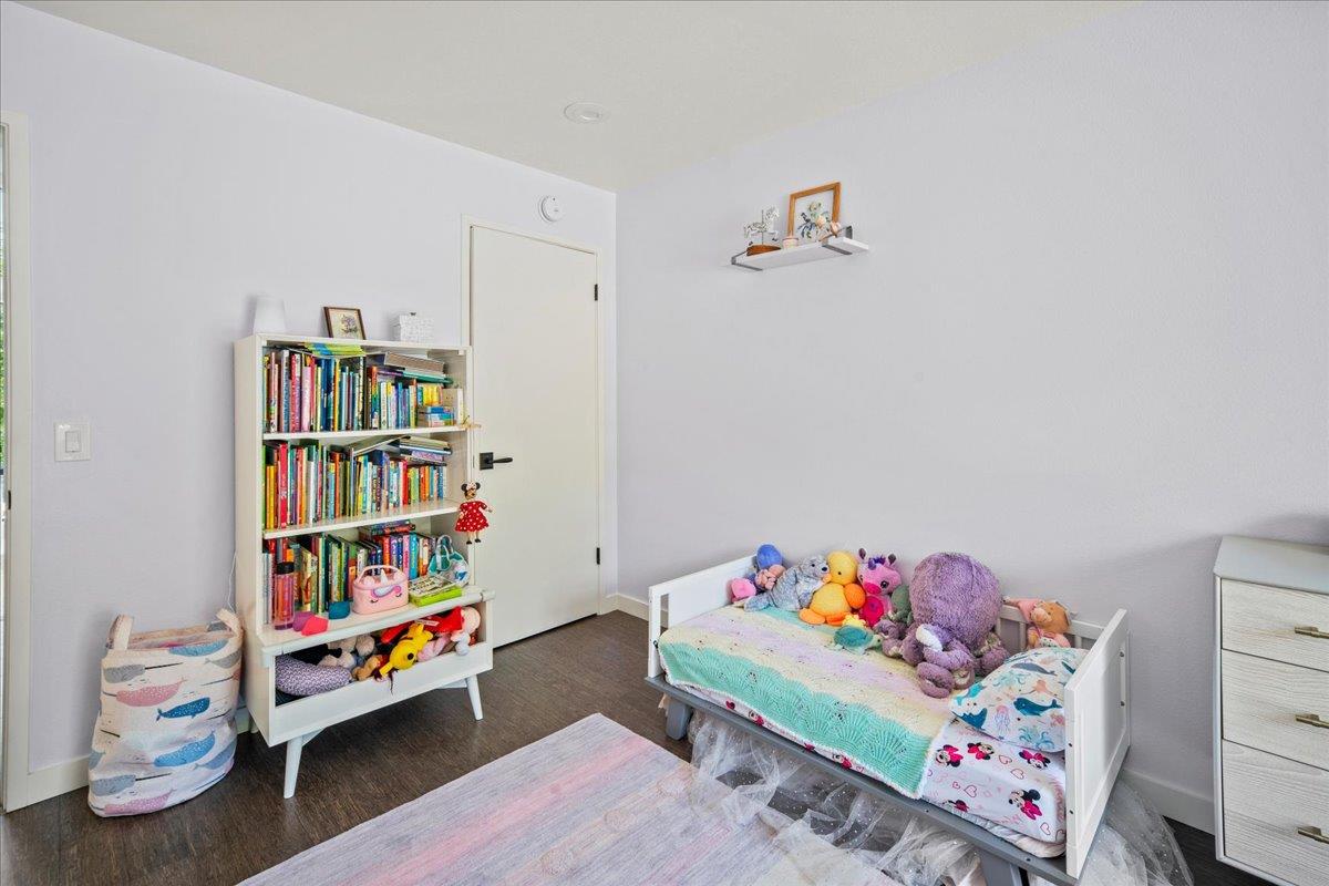 31499 Vía Las Rosas Carmel Valley, CA 93924 - Photo 21 of 44 a room with toys and a book shelf