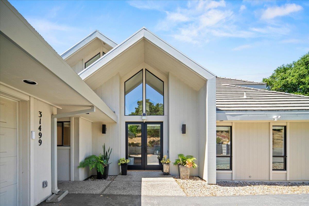 31499 Vía Las Rosas Carmel Valley, CA 93924 - Photo 29 of 44 a front view of a house