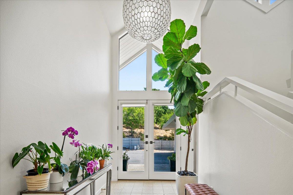 31499 Vía Las Rosas Carmel Valley, CA 93924 - Photo 3 of 44 a vase of flowers sitting on a floor