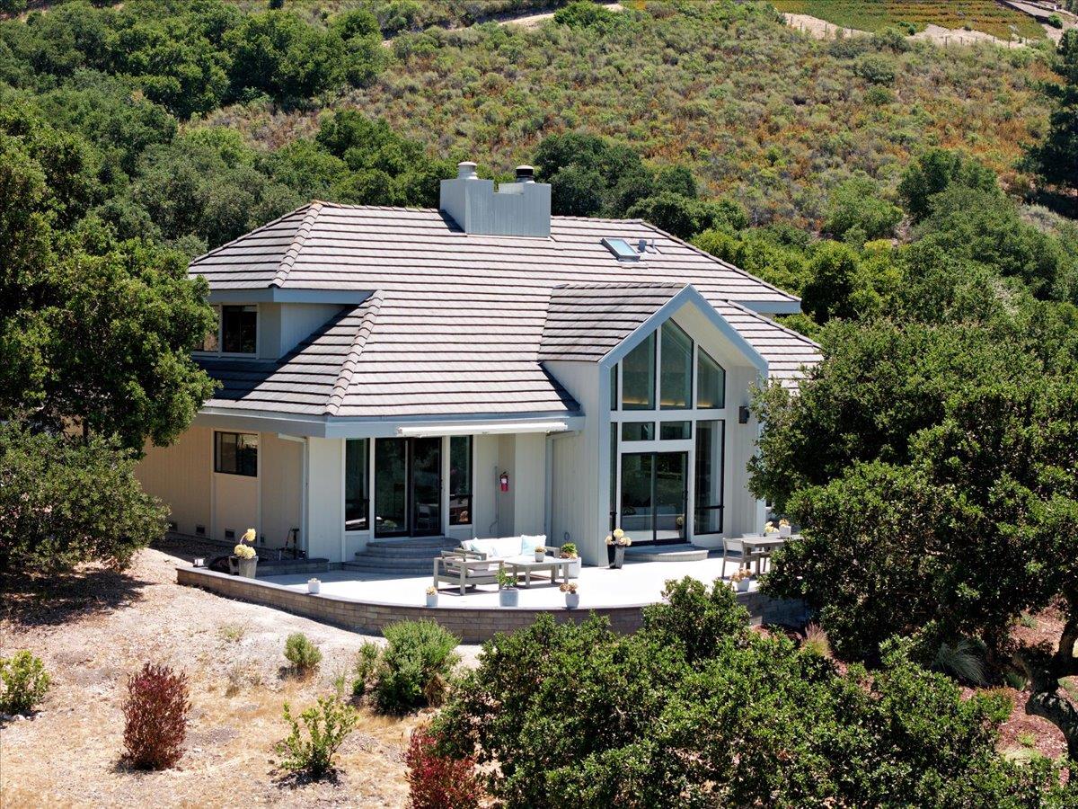 31499 Vía Las Rosas Carmel Valley, CA 93924 - Photo 33 of 44 a view of a house with backyard and sitting area