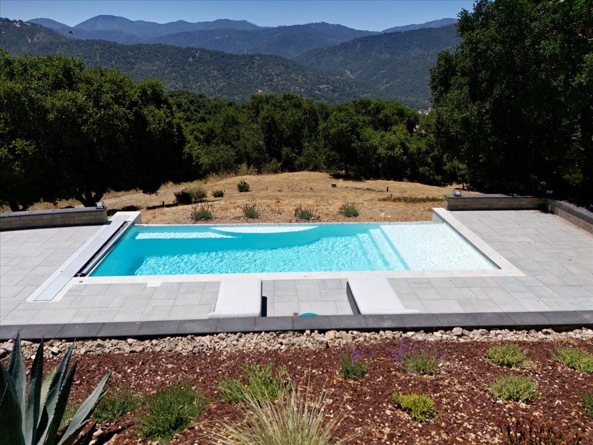 31499 Vía Las Rosas Carmel Valley, CA 93924 - Photo 35 of 44 a view of an outdoor space and a mountain