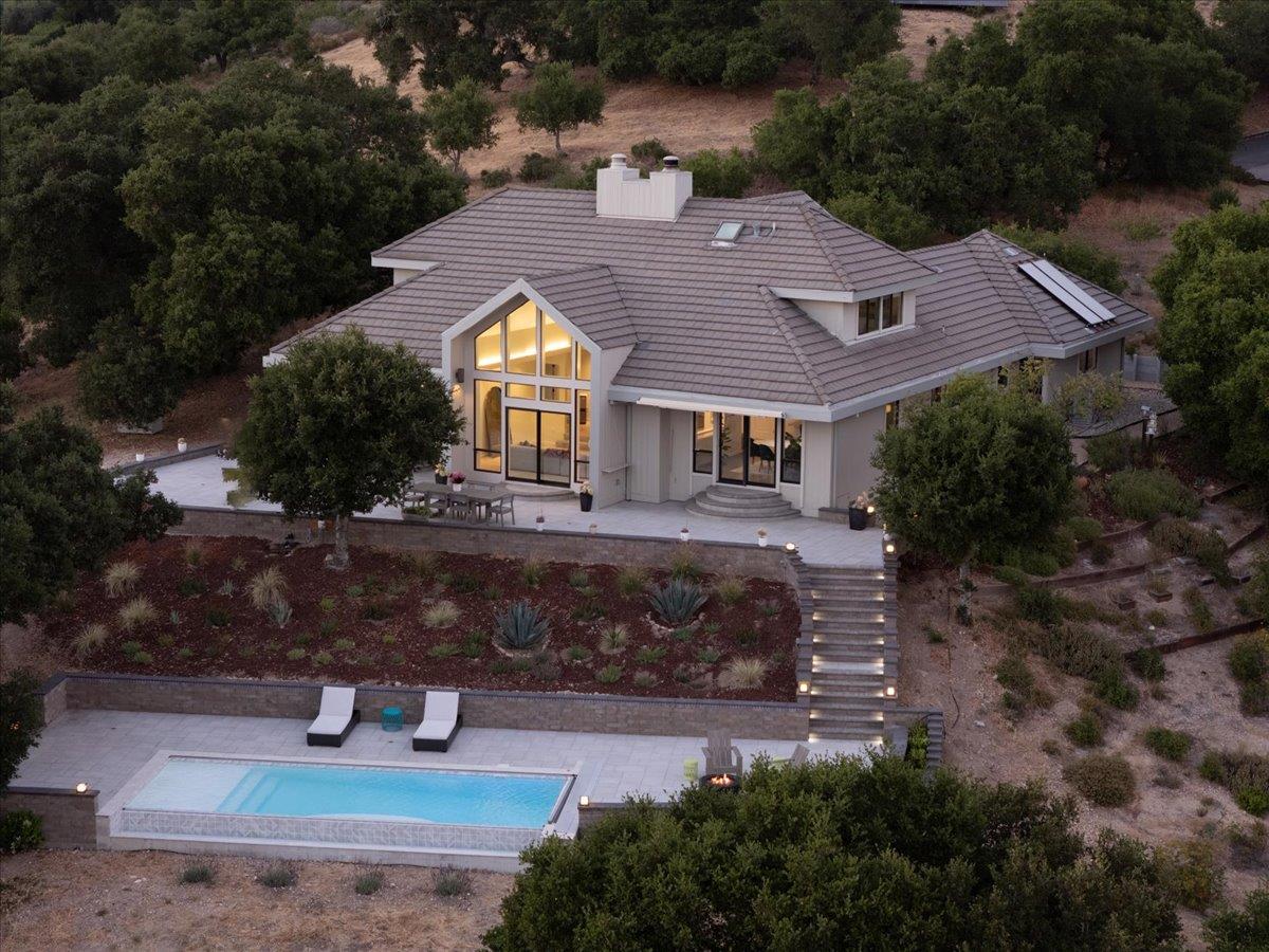 31499 Vía Las Rosas Carmel Valley, CA 93924 - Photo 39 of 44 a aerial view of a house with a garden