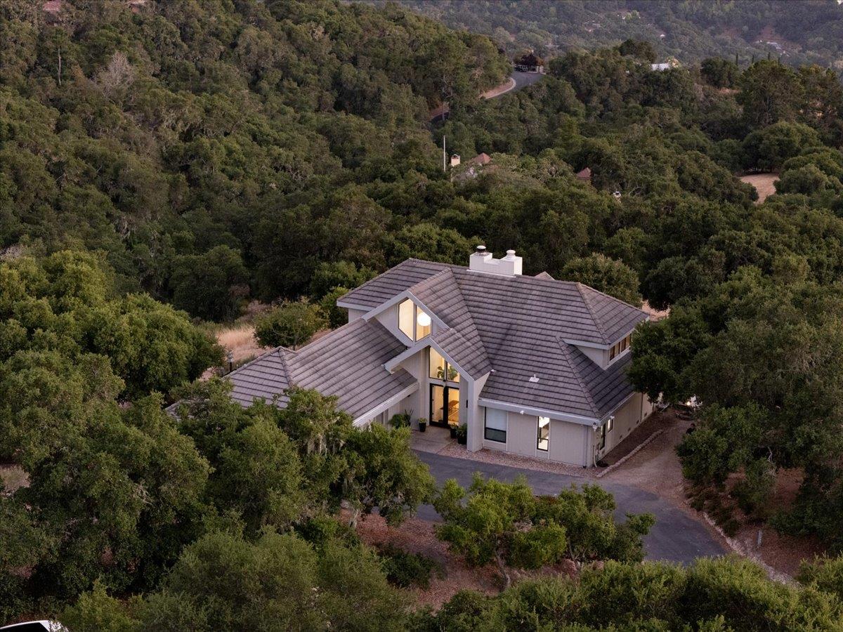 31499 Vía Las Rosas Carmel Valley, CA 93924 - Photo 42 of 44 an aerial view of a house with yard and outdoor space