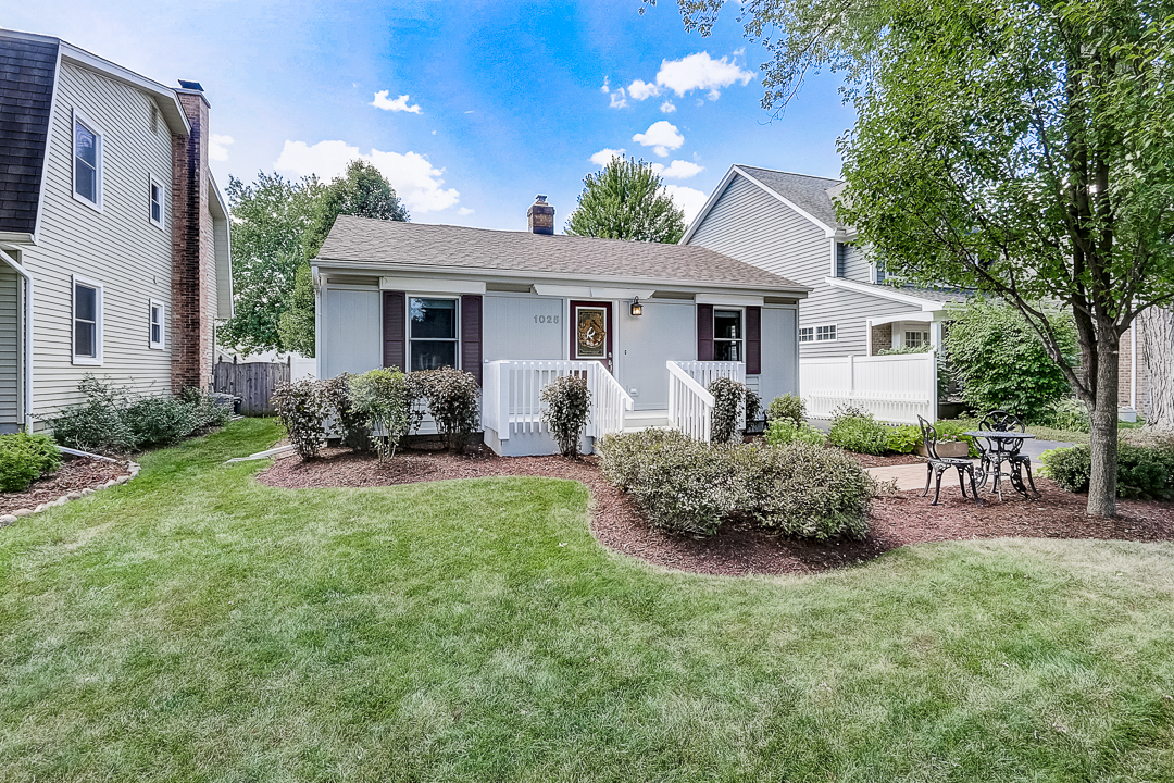 1025 North Main Street Naperville, IL 60563 - Photo 1 of 28 a house view with a garden space