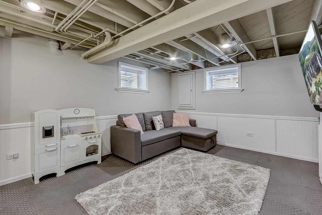 1025 North Main Street Naperville, IL 60563 - Photo 14 of 28 a living room with furniture and white walls
