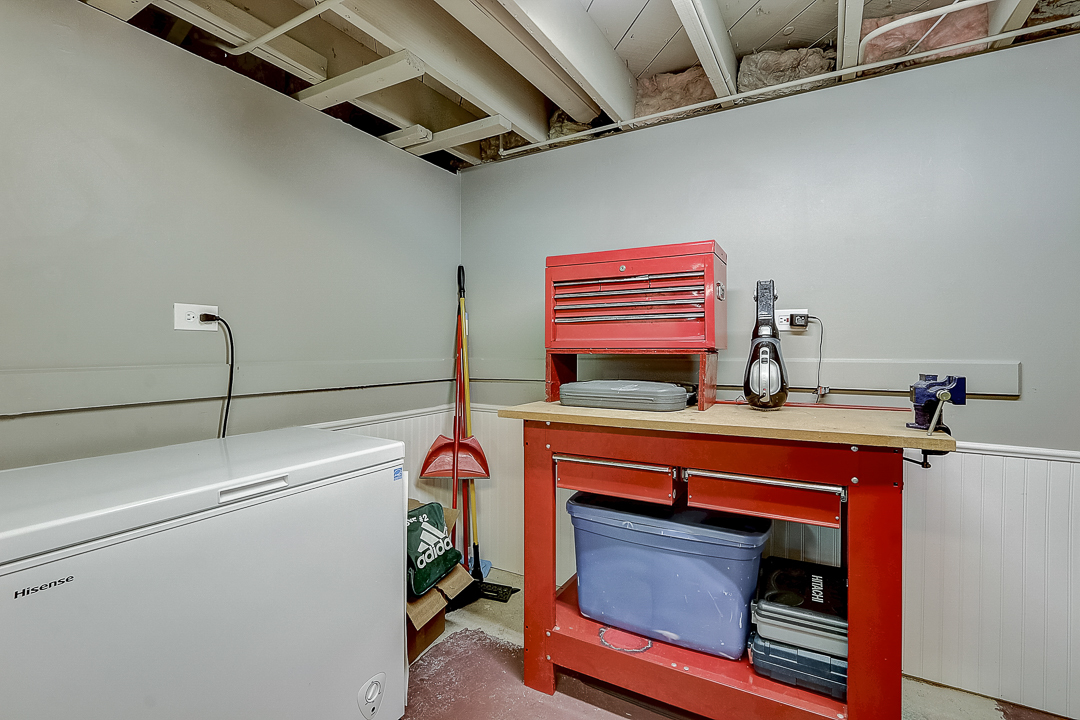 1025 North Main Street Naperville, IL 60563 - Photo 21 of 28 a view of storage and utility room with stairs