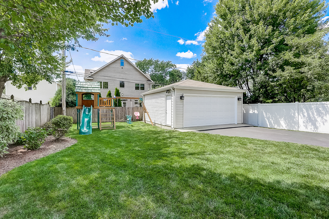 1025 North Main Street Naperville, IL 60563 - Photo 24 of 28 a front view of house with a garden