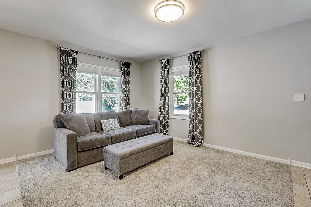1025 North Main Street Naperville, IL 60563 - Photo 4 of 28 a living room with furniture and a window