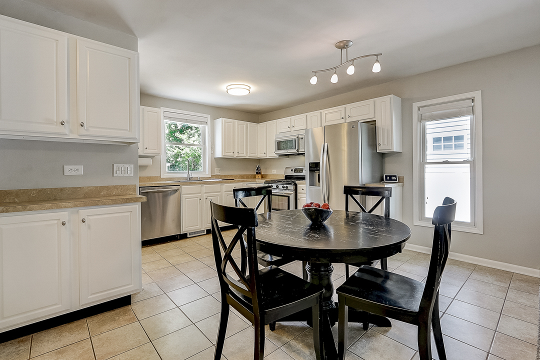 1025 North Main Street Naperville, IL 60563 - Photo 5 of 28 a view of a dining room with furniture and window